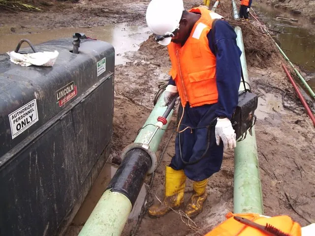 Technician performing maintenance